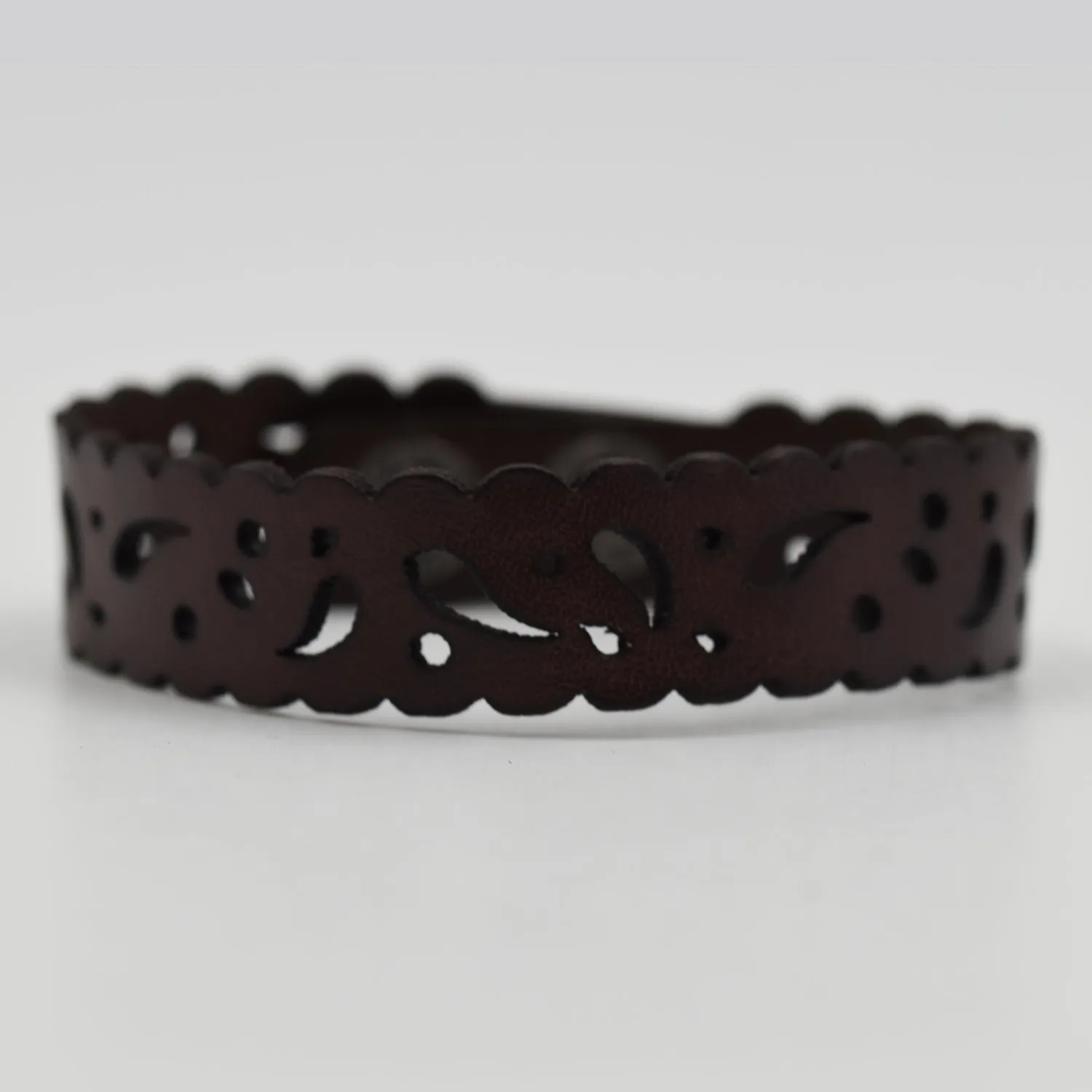 Leather bracelet w/filigree style cutout detail